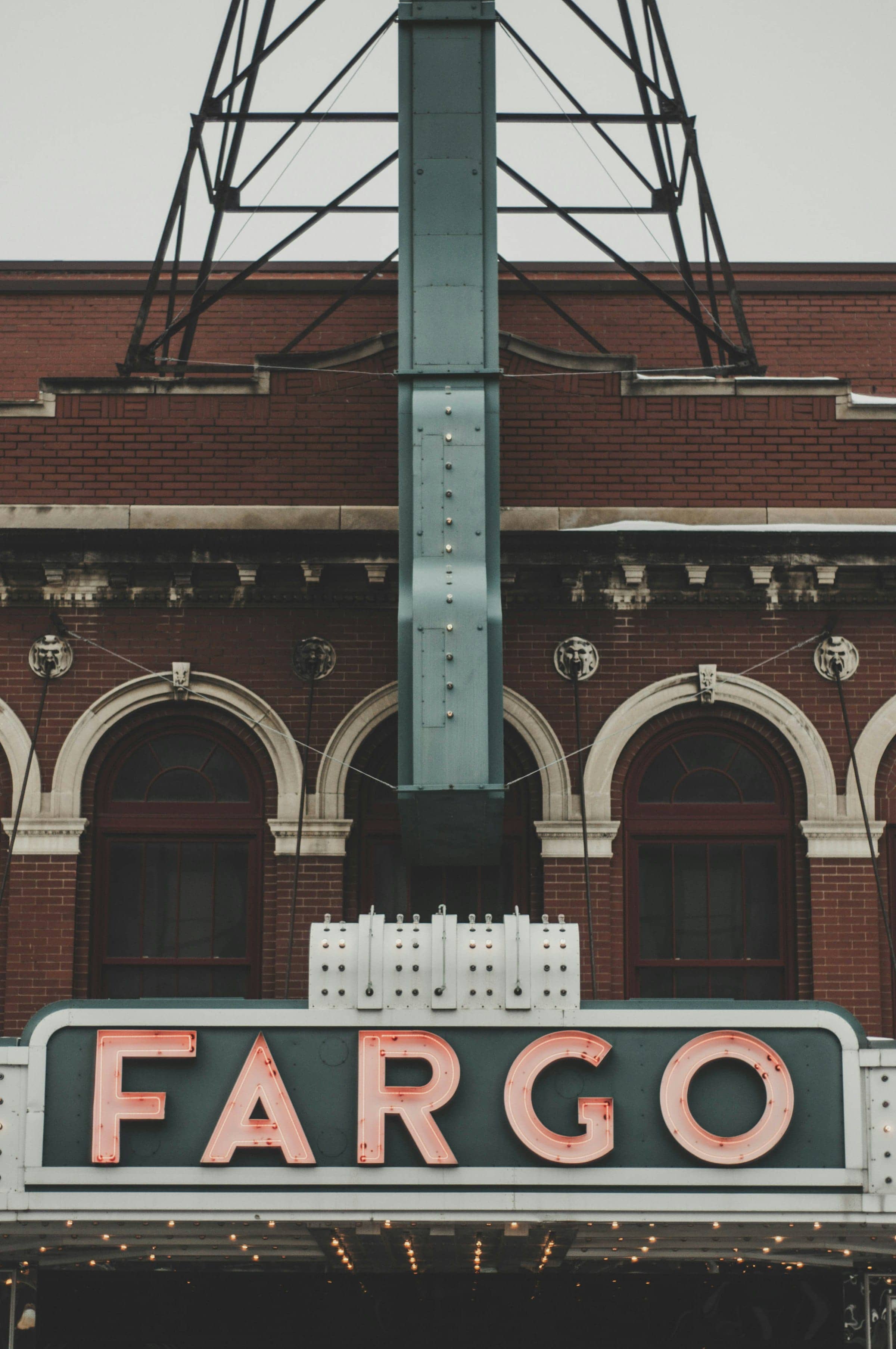 The historic Fargo Theatre's marquee sign on downtown Fargo's red-brick facade